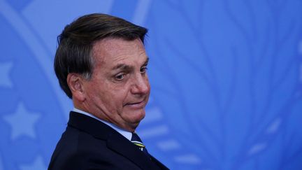 Le président brésilien, Jair Bolsonaro, lors de l'investiture de son nouveau ministre des communications, le 17 juin 2020 à Brasilia (Brésil).&nbsp; (ADRIANO MACHADO / REUTERS)