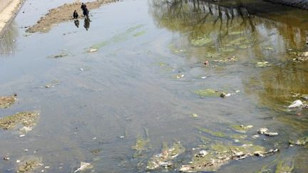 Une rivière polluée en Chine (AFP)