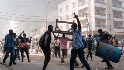 Demonstrators in the streets of Dakar, Senegal, February 9, 2024. (GUY PETERSON / AFP)