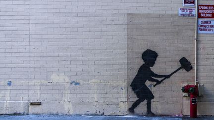 Une peinture de Banksy à New York (24 octobre 2013)
 (Till Jacket / Photononstop / AFP)