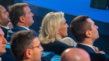 Louis Aliot, Marine Le Pen et Jordan Bardella lors du 17e congrès du RN à Perpignan (Hérault) le 4 juillet 2021 (GOT OLIVIER / MAXPPP)