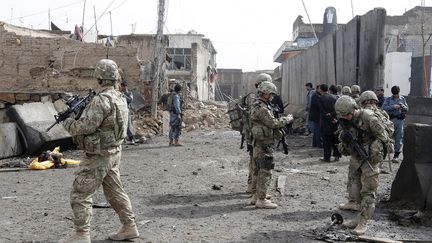 Des soldats am&eacute;ricains et afghans quadrillent la province de Kandahar, bastion taliban du sud de l'Afghanistan, le 20 f&eacute;vrier 2012. (AHMAD NADEEM / REUTERS)