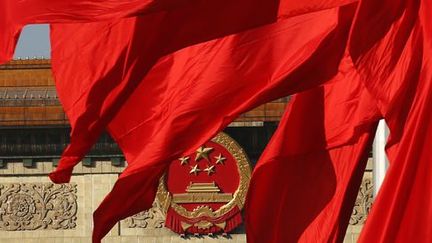 Drapeaux chinois sur la place Tiananmen à Pékin le 12 novembre 2013 (Reuters - Kim Kyung-Hoon)