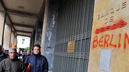 • Les banques allemandes en première ligne en Grèce
 
• Allemagne : les banques discrètes sur la Grèce avant les élections (AFP PHOTO /LOUISA GOULIAMAKI)