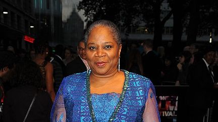 L'artiste nigériane Onyeka Onwenu assiste à la projection de "Half of a Yellow Sun" lors du 57e BFI London Film Festival à l'Odeon West End, le 19 octobre 2013, à Londres, (EAMONN M. MCCORMACK / GETTY IMAGES EUROPE)