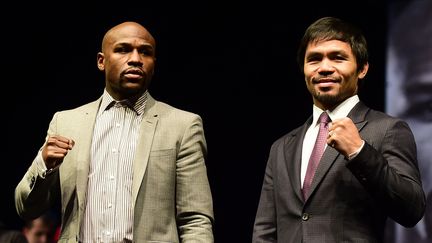 Les boxeurs Floyd Mayweather et Manny Pacquiao, le 2 mai 2015 &agrave; Las Vegas (Etats-Unis). (FREDERIC J. BROWN / AFP)