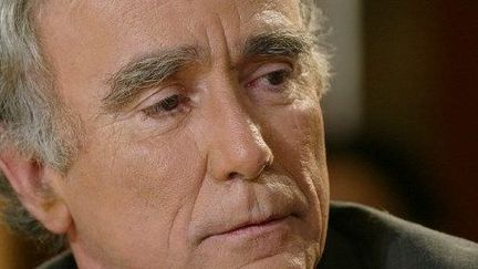 Jean-Claude Guillebaud, le 18 septembre 2003 à Paris, lors de l'enregistrement de l'émission de France 3 Culture et dépendances. Il y présentait son ouvrage «Le goût de l'avenir». (JEAN-PIERRE MULLER / AFP)