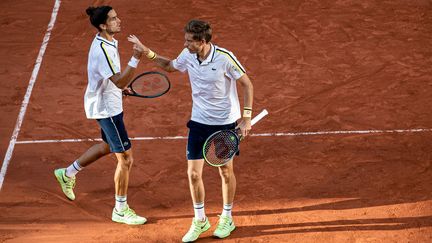 Pierre-Hugues Herbert et Nicolas Mahut lors de leur victoire à Roland-Garros, le 12 juin 2021. (MAXPPP)