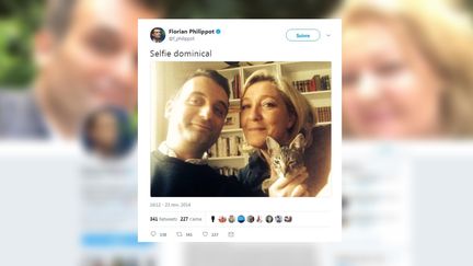 Florian Philippot publie une photo de lui et Marine Le Pen, avec un chat, sur Twitter le 23 novembre 2014. (FLORIAN PHILIPPOT / TWITTER)