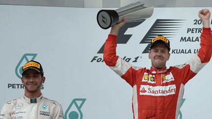 Le pilote allemand Sebastian Vettel a remporté sur Ferrari le GP de Malaisie devant Lewis Hamilton