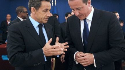 Nicolas Sarkozy et le Premimer ministre britannique David Cameron, le 1er septembre 2011 à Paris. (PATRICK KOVARIK / AFP)