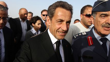 L'ancien pr&eacute;sident Nicolas Sarkozy, en Libye, le 19 mars 2013, &agrave; la veille de sa mise en examen. (ABDULLAH DOMA / AFP)