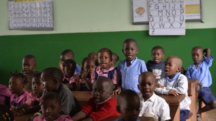 Des écoliers dans une école&nbsp;de Bangui (Centrafrique), le 3 avril 2014. (MIGUEL MEDINA / AFP)