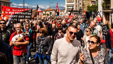 Des manifestants contre la réforme des retraites, à Perpignan, le 1er mai 2023. (JC MILHET / HANS LUCAS / AFP)