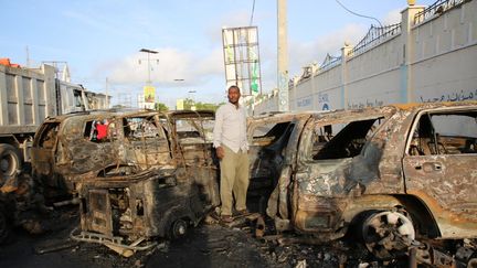 A car bomb explodes outside a cafe in Mogadishu, Somalia, on July 14, 2024. (ABUUKAR MOHAMED MUHIDIN / ANADOLU / AFP)