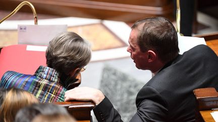 Elisabeth Borne et Olivier Dussopt, le 28 février 2023, à l'Assemblée nationale. (BERTRAND GUAY / AFP)