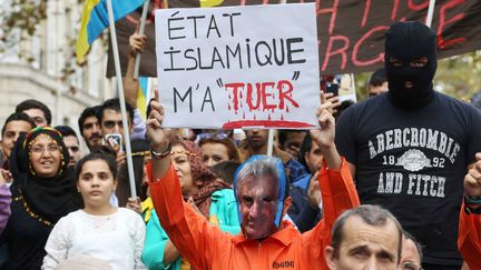 &nbsp; (Lors d'une manifestation à Paris, en soutien à la ville de Kobané assiégée par Daech, le 11 octobre dernier © MAXPPP)