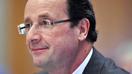 Le candidat socialiste &agrave; la pr&eacute;sidentielle, Fran&ccedil;ois Hollande, pr&eacute;side une s&eacute;ance du conseil g&eacute;n&eacute;ral de Corr&egrave;ze, le 23 mars 2012 &agrave; Tulle. (THIERRY ZOCCOLAN / AFP)