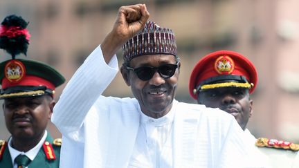 Le président Buuhari lors d'une parade militaire à Abuja le 12 juin 2019. (PIUS UTOMI EKPEI / AFP)