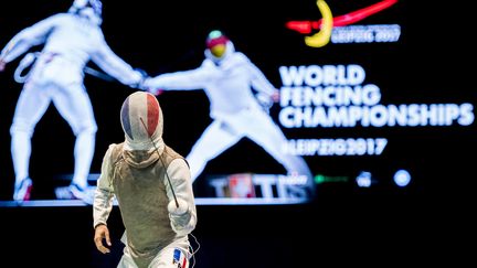 Erwann Le Pechoux et l'équipe de France de Fleuret ont ramené le bronze de Leipzig.  (ROBERT MICHAEL / AFP)