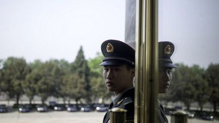 Une nouvelle loi en Chine, adpotée le 28 avril 2016, donne aux autorités et à la police des pouvoirs illimités pour contrôler les ONG. (FRED DUFOUR / AFP)