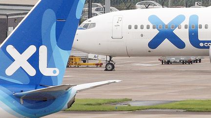 Des avions XL Airways sur l'aéroport de Manchester (Grande-Bretagne). (PAUL ELLIS / AFP)