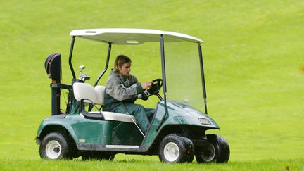 Voiturette de golf. (JACQUES DEMARTHON / AFP)