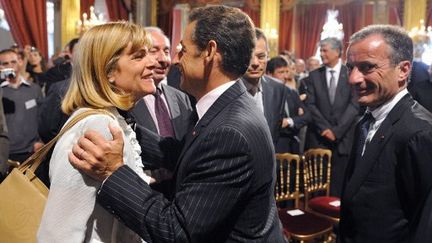 Anne Lauvergeon, Nicolas Sarkozy et le patron d'EDF, Henri Proglio (ERIC FEFERBERG / POOL / AFP)