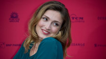 L'actrice Julie Gayet pose lors du Champs-Elys&eacute;es Film Festival, le 12 juin 2013, &agrave; Paris.&nbsp; (LIONEL URMAN / SIPA)