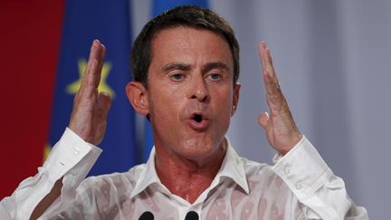 &nbsp; (Manuel Valls pendant le discours de clôture de l'université d'été de La Rochelle © REUTERS / Stéphane Mahe)