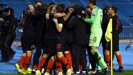 La joie des Croates, vainqueurs de l'Espagne dans les dernières secondes. (- / AFP)