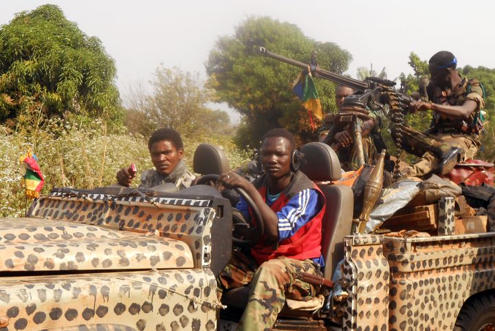 Des rebelles de la Séléka en patrouille près de la localité de Damara en Centrafrique, le 8 janvier 2013. (STR / AFP)