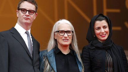 Nicolas Winding Refn, Jane Campion et Leila Hatami, membres du jury de Cannes, assistent à la dernière projection de la Palme d'or, "Winter Sleep", de Nuri Bilge Ceylan
 (Sébastion Nogier / EPA / MAXPPP)