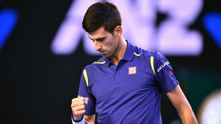 Novak Djokovic serre le poing après avoir remporté un point face à Andy Murray en finale de l'Open d'Australie le 31 javnier 2016 à Melbourne. (PETER PARKS / AFP)