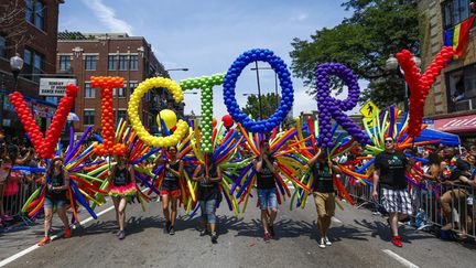 &nbsp; (La communauté LGBT de Chicago fête la décision de la Cour Suprême d'autoriser le mariage homosexuel dans tous les Etats-Unis © MaxPPP)