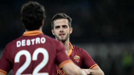 Destro et Pjanic ont régalé la Roma (FILIPPO MONTEFORTE / AFP)