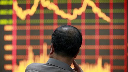 La Bourse de&nbsp;Huaibei, dans l'est de la Chine, le 9 mai 2012. (XIE ZHENGYI / IMAGINECHINA / AFP)