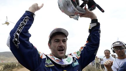 Marc Coma savoure sa nouvelle victoire sur le Dakar (FRANCK FIFE / AFP)