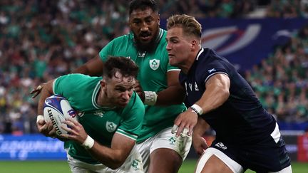 L'Irlandais Hugo Keenan a été l'un des grands artisans de la victoire face à l'Ecosse, le 7 octobre 2023 au Stade de France. (ANNE-CHRISTINE POUJOULAT / AFP)