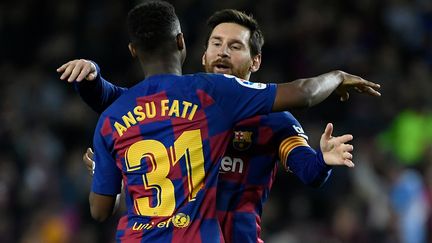 Ansu Fati et Lionel Messi, dimanche 2 février 2020, après la victoire du FC Barcelone contre Levante (2-1). (LLUIS GENE / AFP)