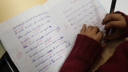 &nbsp; (Dans un sondage, 73% des parents d'élèves estiment que les notes découragent les élèves © MAXPPP)