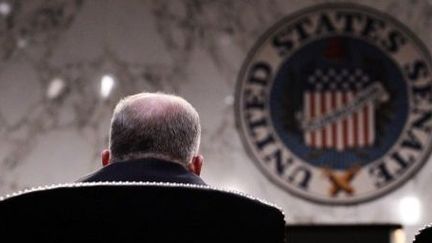 ​John Brennan, ici de dos, est le directeur de la CIA depuis le 8 mars 2013. Il était auparavant le conseiller de Barack Obama pour la sécurité intérieure et la lutte antiterroriste. (AFP PHOTO / JEWEL SAMAD)