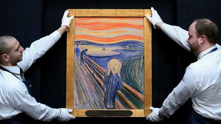 "Le Cri", un pastel d'Edvard Munch, est adjugé, en mai 2012, 119,9 millions de dollars chez Sotheby's, la maison concurrente à New York. (OLI SCARFF / GETTY IMAGES EUROPE)