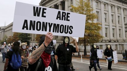  (Des Anonymous lors d'une manifestation à Washington, début novembre © REUTERS / Gary Cameron)