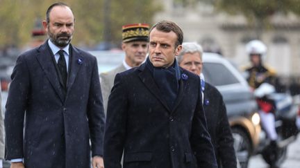 Le président de la République, Emmanuel Macron, et son Premier ministre, Edouard Phillipe, le 11 novembre 2019 à Paris. (LUDOVIC MARIN / AFP)