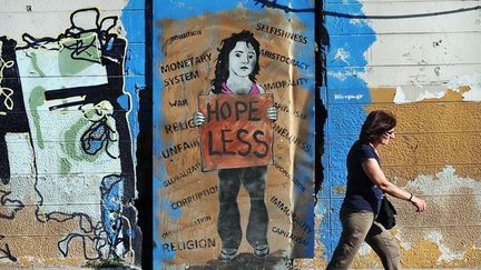  
• Comment voter quand on est désespéré?
 
• Le cas de la Grèce est désespéré
 
• Grèce : quand tout un peuple se paupérise (AFP PHOTO/ LOUISA GOULIAMAKI)