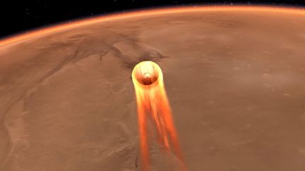 Modélisation de la sonde InSight en train d'atterrir sur Mars. L'évènement doit se dérouler dans la soirée du 26 novembre 2018. (NASA / JPL-CALTECH / AFP)