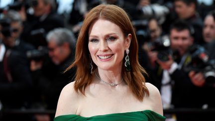 La star hollywoodienne Julianne Moore rayonne. Elle fait partie des habitués de la Croisette et encore fois présente pour cette 72e cérémonie. (CHRISTOPHE SIMON / AFP)