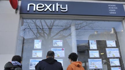 Une agence du groupe Nexity à Paris, le 14 octobre 2021. (SERGE ATTAL/UNIQUEMENT FRANCE/AFP)