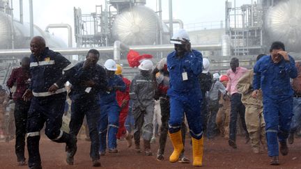 Une pluie torrentielle s'abat sur les gisements de pétrole d'Al-Nar, dans l'Etat de Ruweng au Soudan du Sud, le 30 avril 2019. (JOK SOLOMUN / REUTERS)